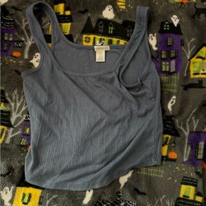 I am selling this cute blue Bozzolo crop top.